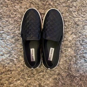 Black Steve Madden slip ons